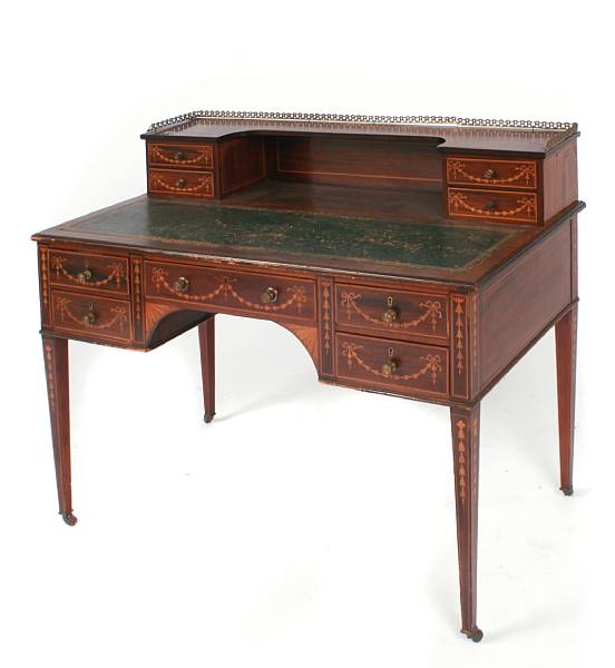 Appraisal: An Edwardian inlaid mahogany writing desk height in width in