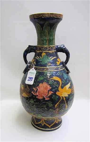 Appraisal: CHINESE POTTERY VASE with cobalt blue field accented by colorful