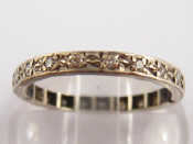 Appraisal: A white metal tests carat white gold diamond eternity ring