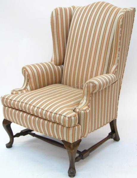 Appraisal: A vintage Queen Anne style wing chair striped upholstery cabriole