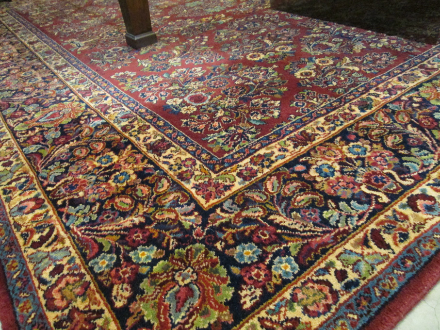 Appraisal: A KARASTAN AMERICAN ORIENTAL CARPET Persian Sarouk design on red