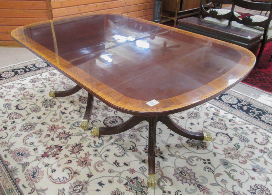 Appraisal: A RECTANGULAR FEDERAL STYLE MAHOGANY DINING TABLE WITH TWO LEAVES