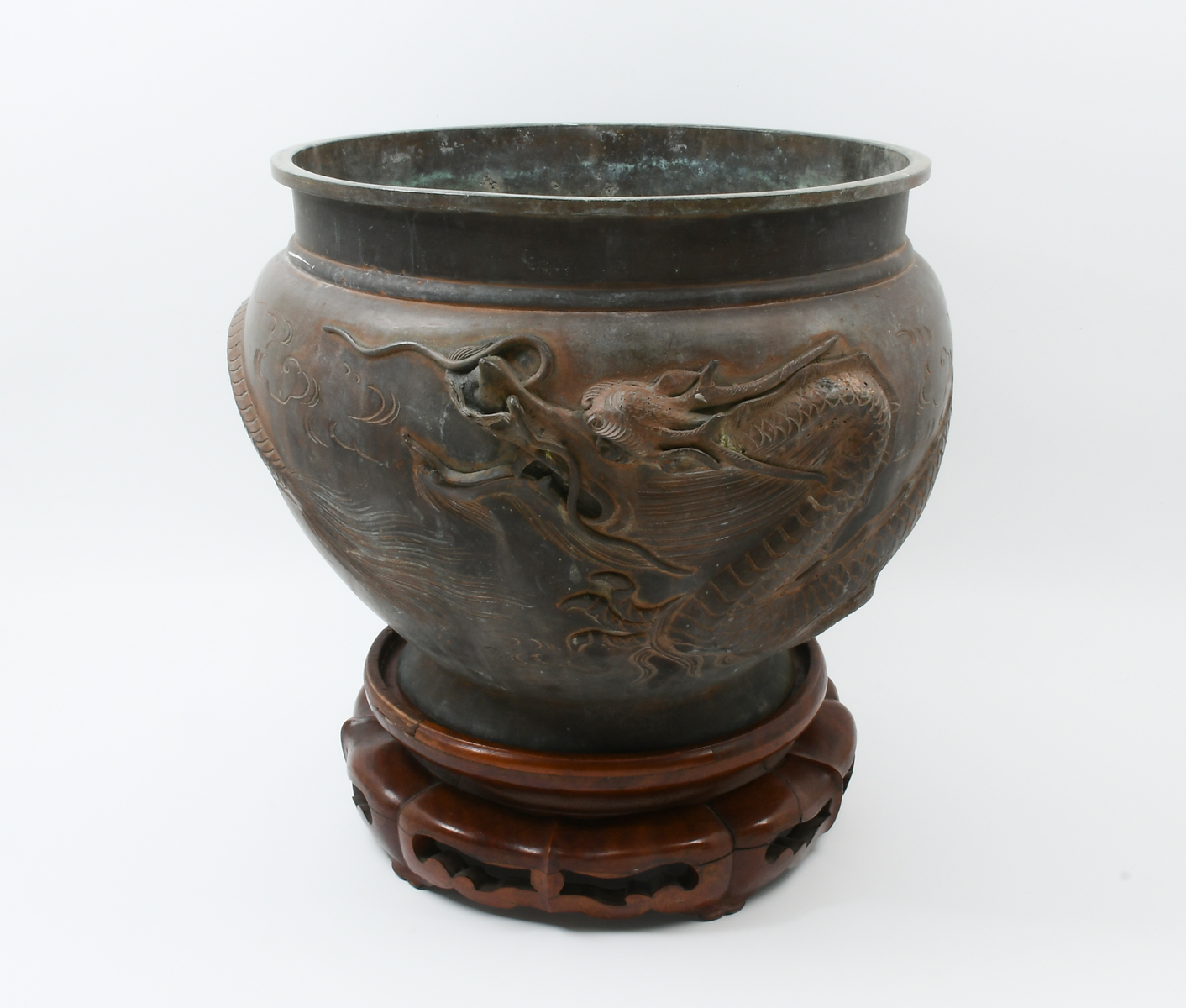 Appraisal: ASIAN DRAGON MOTIF BRONZE JARDINIERE Bronze jardiniere having an encompassing