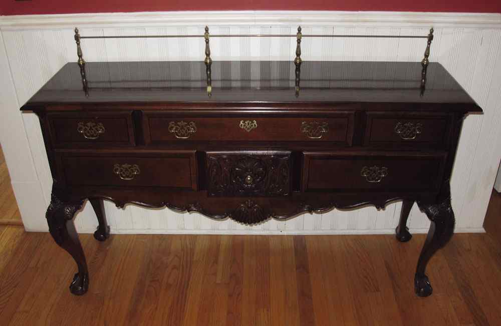 Appraisal: STANLEY FURNITURE CHIPPENDALE STYLE SIDEBOARD Brass back rail drawers over