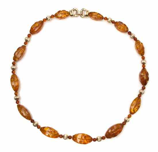 Appraisal: A Karat Yellow Gold Diamond and Amber Necklace containing carved