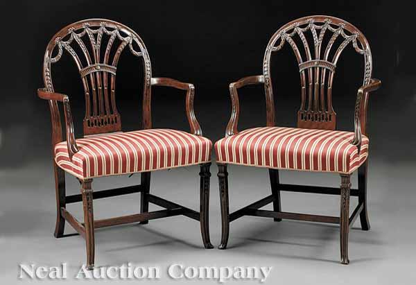 Appraisal: A Pair of Antique George III-Style Carved Mahogany Armchairs in