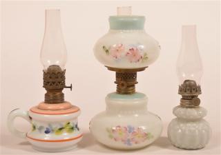 Appraisal: Three Antique Milk Glass Miniature Fluid Lamps Tallest - h