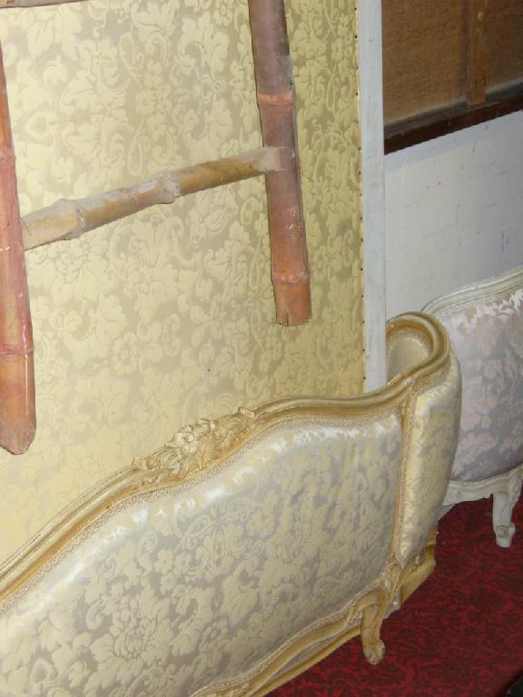 Appraisal: A continental foot double bedstead with shaped carved an moulded