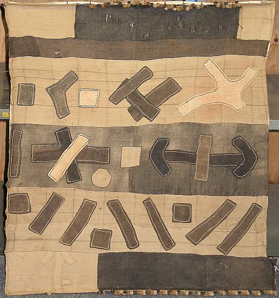 Appraisal: A Kuba textile fragment mounted on a wood panel dimensions