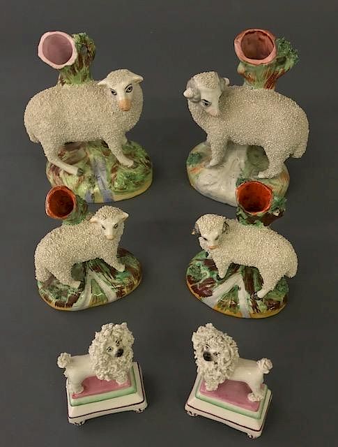 Appraisal: Two Pair of Staffordshire Sheep Spill Vases Poodles Two pair