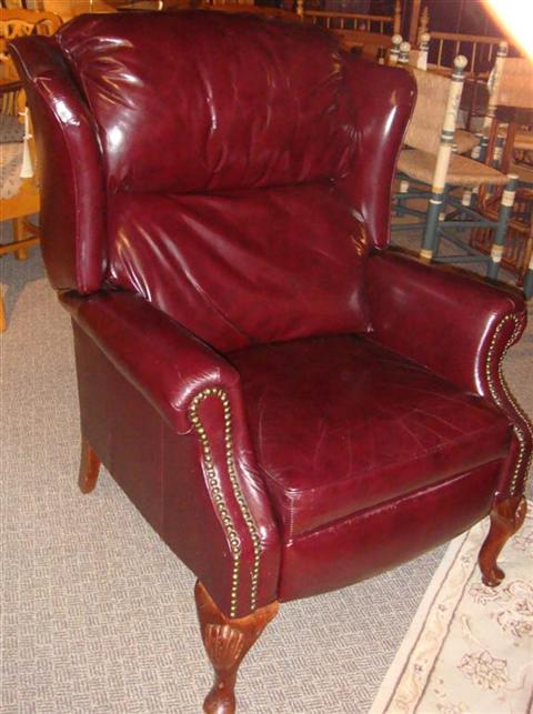 Appraisal: CRANBERRY LEATHER RECLINER Provenance ANTIQUE CONTEMPORARY LEASING INC