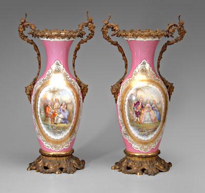 Appraisal: Pair ormolu-mounted porcelain urns hand-painted oval reserve with colonial figures