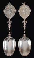 Appraisal: PAIR OF CONTINENTAL FANCY LARGE STERLING SILVER SPOONS Elongated oval