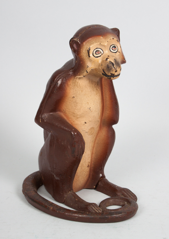 Appraisal: Cast iron painted monkey doorstop first quarter- th century probably