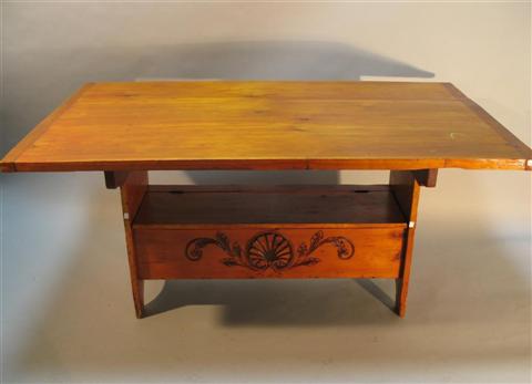 Appraisal: COLONIAL STYLE PINE TAVERN TABLE The hinged rectangular top with