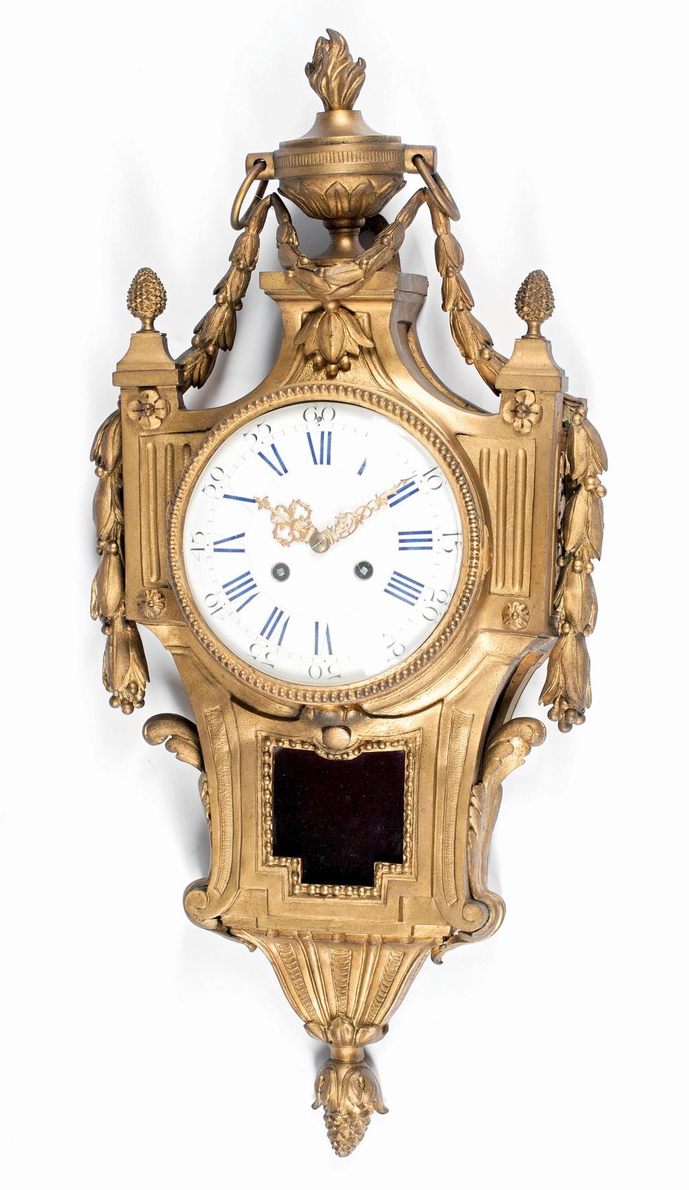 Appraisal: French Gilt Bronze Cartel Clock th c flaming urn finial