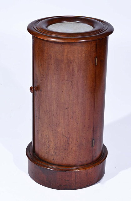 Appraisal: A VICTORIAN MAHOGANY CYLINDRICAL POT CUPBOARD with inset ivory top