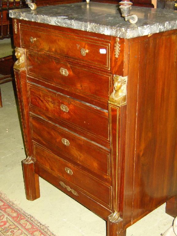 Appraisal: A French walnut upright chest of five drawers with marble