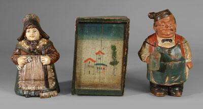 Appraisal: Candle box tobacco jars molded and painted earthenware innkeeper holding