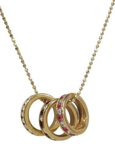 Appraisal: EternaGold kt yellow gold necklace three ring pendants set with