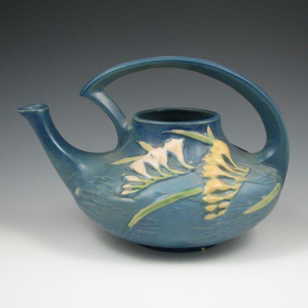 Appraisal: Roseville Freesia teapot in blue Marked Roseville USA T Small