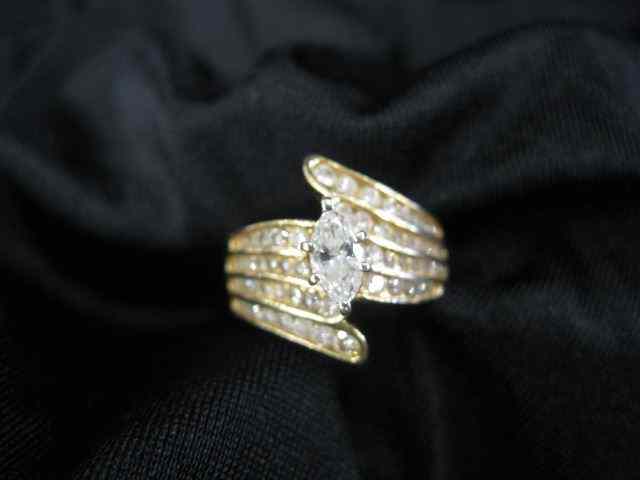 Appraisal: Diamond Ring carat marquise diamondsurrounded by round diamonds totaling carat