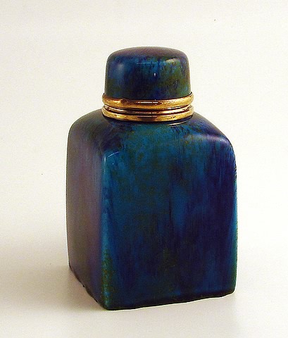 Appraisal: Block form with blue and green streaked glaze t signed