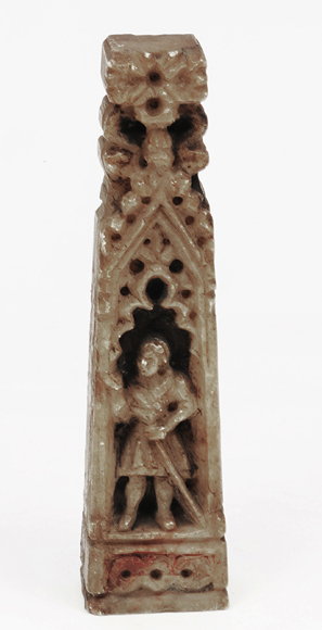 Appraisal: A SMALL TH CENTURY ALABASTER CARVING depicting a standing figure