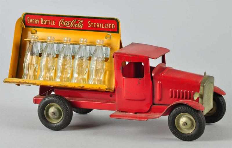 Appraisal: s Coca-Cola Metalcraft Truck Toy Description The tires are rubber