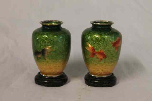 Appraisal: A PAIR OF JAPANESE GINBARI ENAMEL SMALL VASES and stands