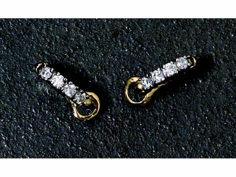 Appraisal: DIAMOND EARRINGS Two tone hoops with clip backs for pierced