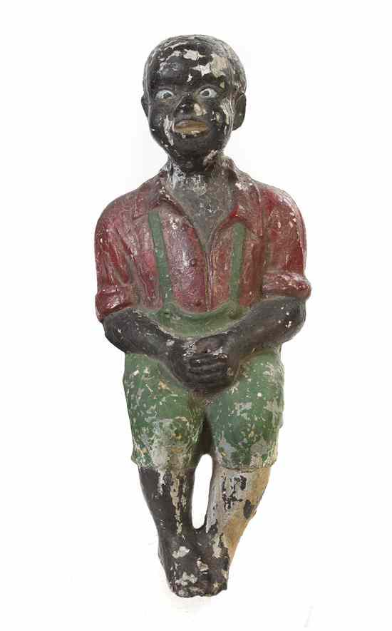 Appraisal: A Polychrome Decorated Cast Black Americana Concrete Figure depicting a