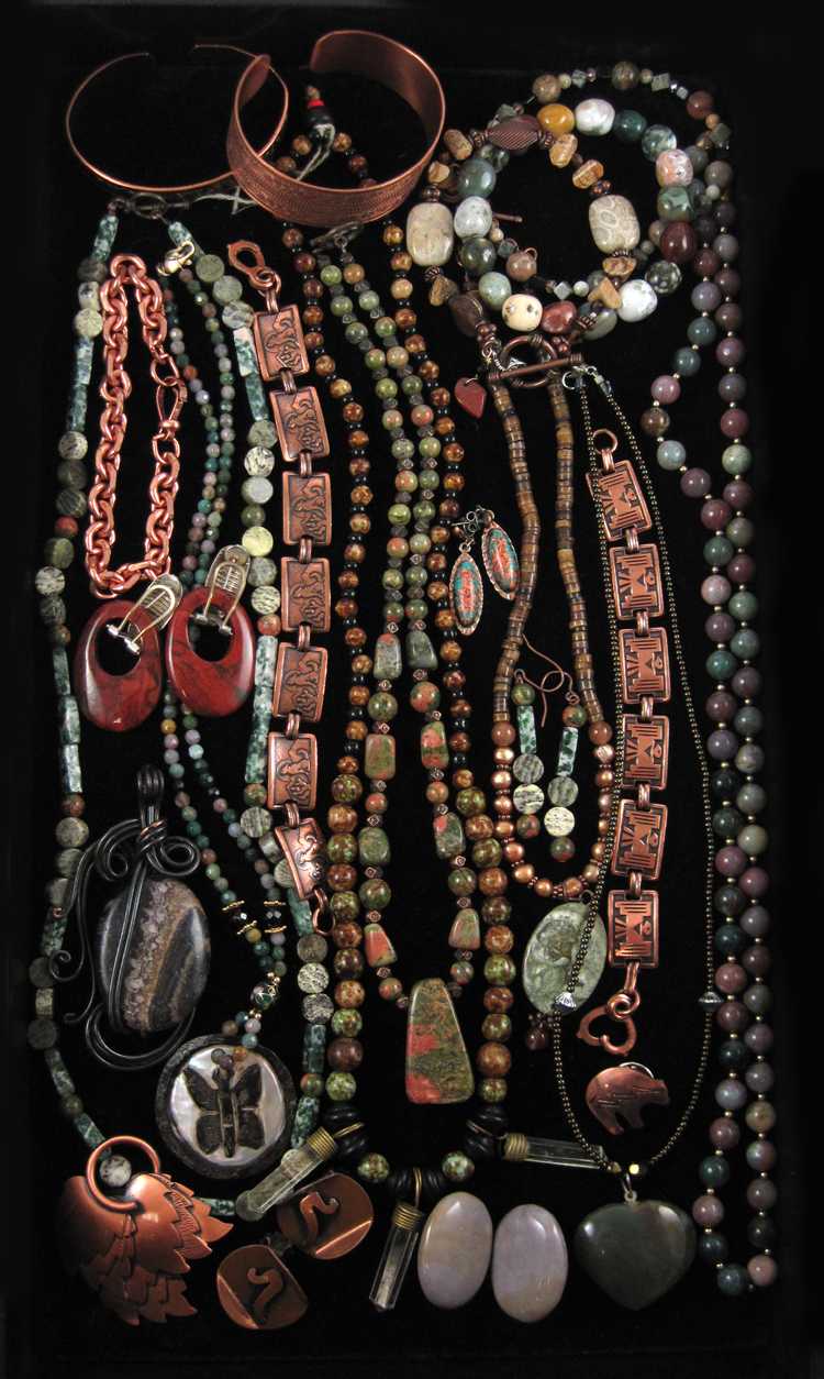 Appraisal: TWENTY-EIGHT ARTICLES OF JASPER COPPER AND STONE JEWELRY including seven