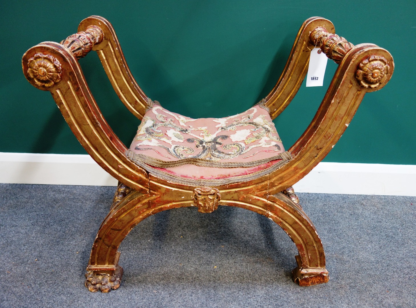 Appraisal: A th century Italian giltwood X frame stool on paw