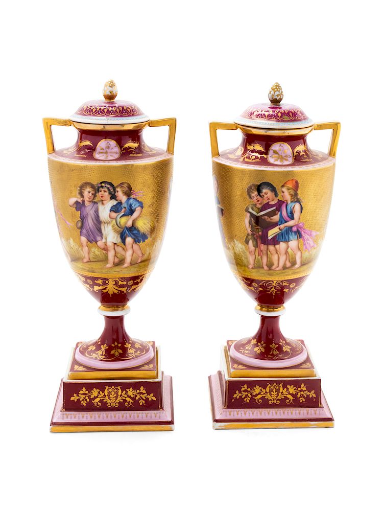 Appraisal: A Pair of Vienna Porcelain Urns A Pair of Vienna