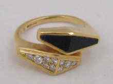 Appraisal: An carat gold ring of geometric design set with diamonds