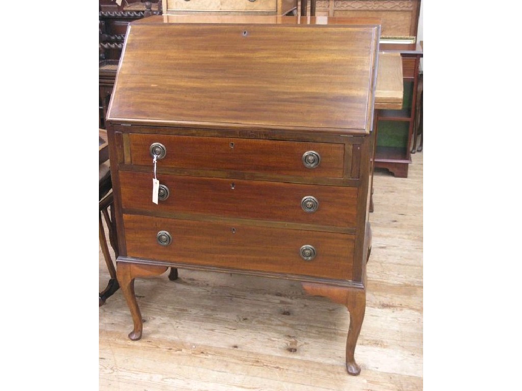 Appraisal: An early th century mahogany bureau fall front enclosing fitted