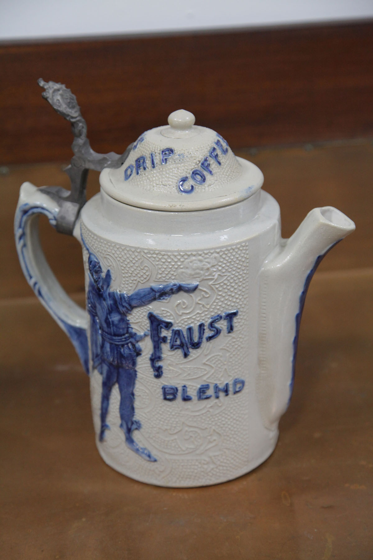 Appraisal: ADVERTISING COFFEE POT American first half th century White clay