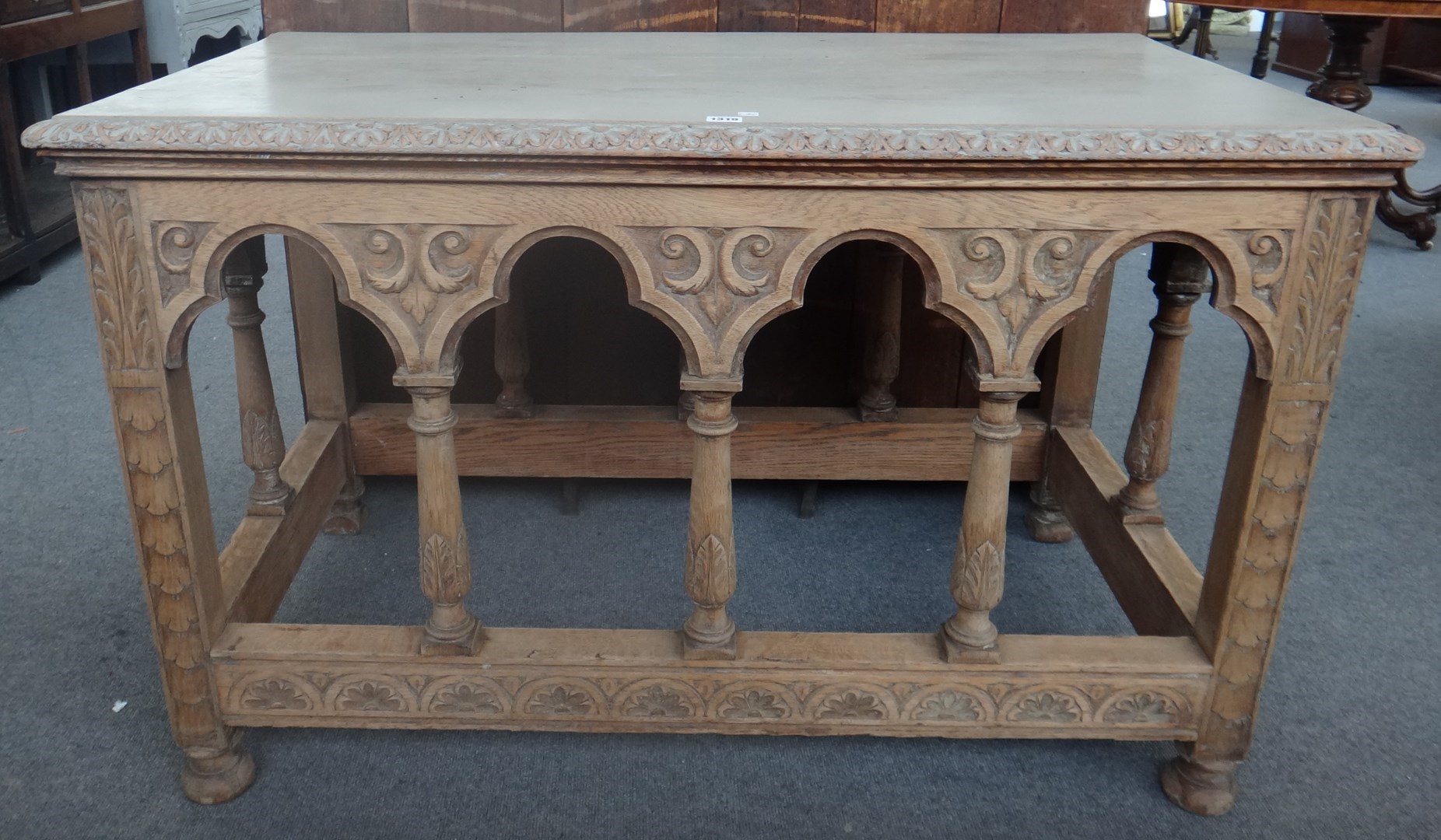 Appraisal: A th century oak rectangular centre table with Gothic arch