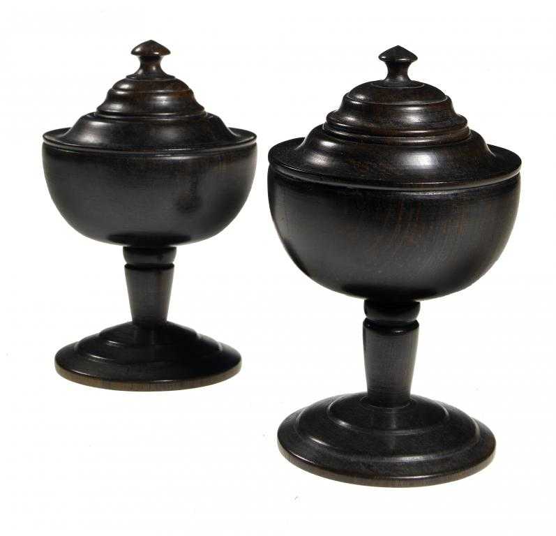 Appraisal: TWO TREEN SPICE JARS AND COVERS of ebony or other