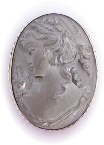 Appraisal: Large stone carved cameo pin depicting young woman in silvered