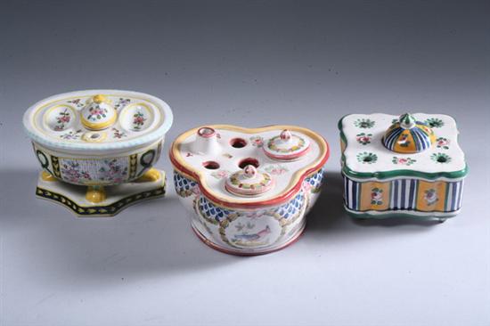 Appraisal: THREE FRENCH FA ENCE INKWELLS One oval on paw feet