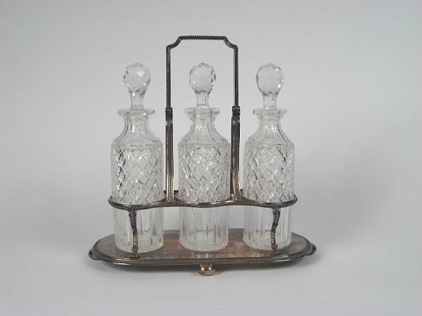 Appraisal: A Victorian silver plated and cut glass tantalus mid th