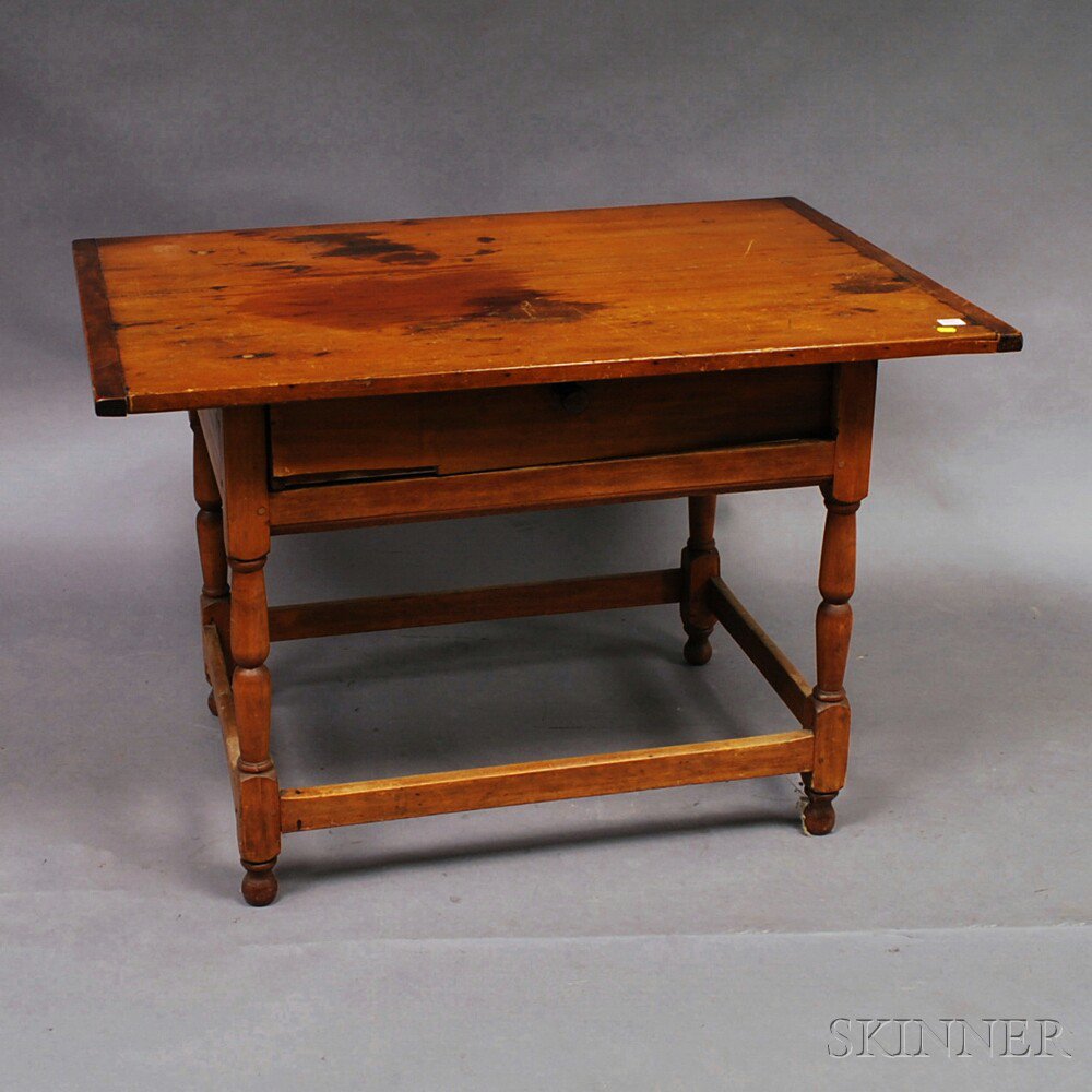 Appraisal: Country Maple Tavern Table the overhanging rectangular top with breadboard