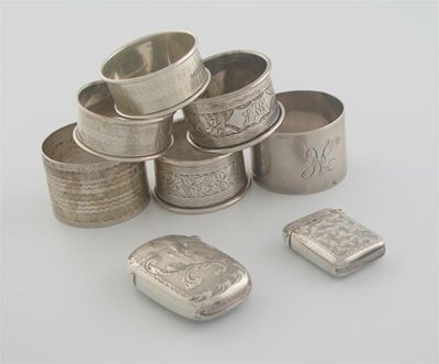 Appraisal: Two vesta cases and six various napkin rings oz