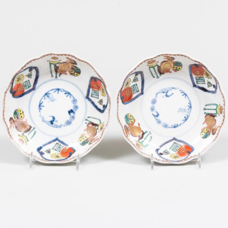 Appraisal: Pair of Japanese Porcelain Lobed Bowls Unmarked in diam Condition