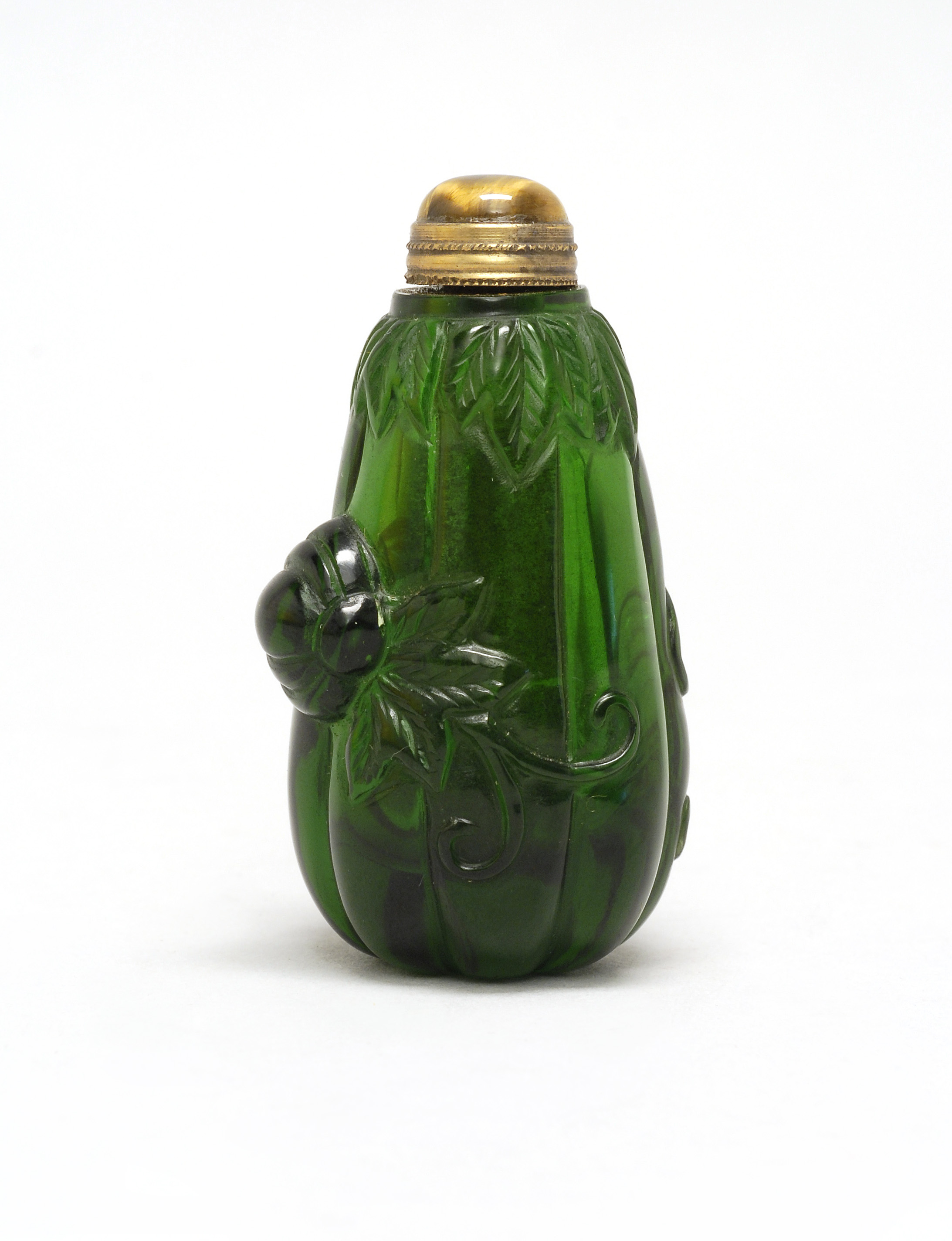 Appraisal: GREEN GLASS SNUFF BOTTLE Early th CenturyIn fruit form with