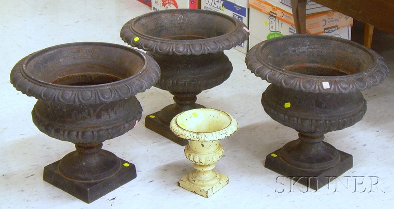 Appraisal: Set of Three Black-painted Cast Iron Garden Urns and a