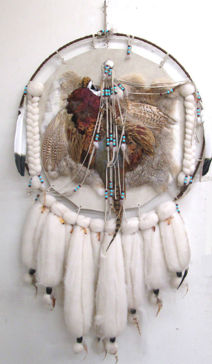 Appraisal: NATIVE AMERICAN INDIAN DREAMCATCHER WALL HANGING featuring a buckskin panel