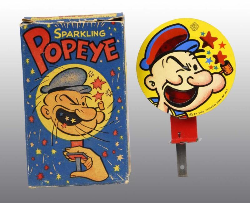 Appraisal: Tin Chein Popeye Sparkler Toy Description American Circa Working but